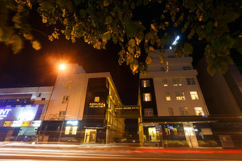 Hotel Front - Evening or Night
